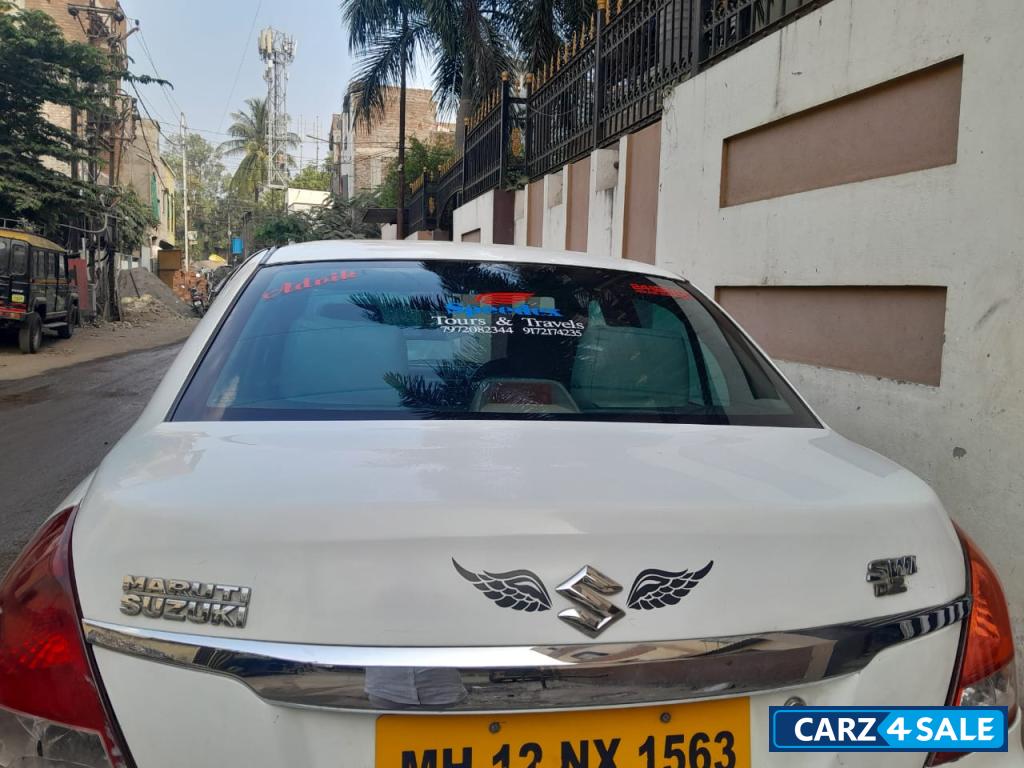 White Maruti Suzuki Swift Desire Tour