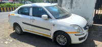 White Maruti Suzuki Swift Desire Tour
