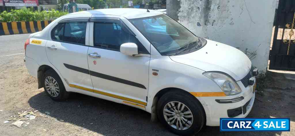 White Maruti Suzuki Swift Desire Tour