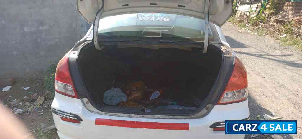 White Maruti Suzuki Swift Desire Tour