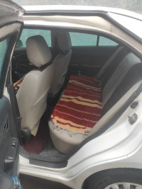 White Maruti Suzuki Swift Desire Tour