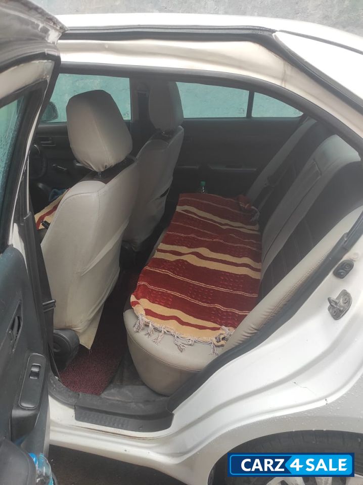 White Maruti Suzuki Swift Desire Tour