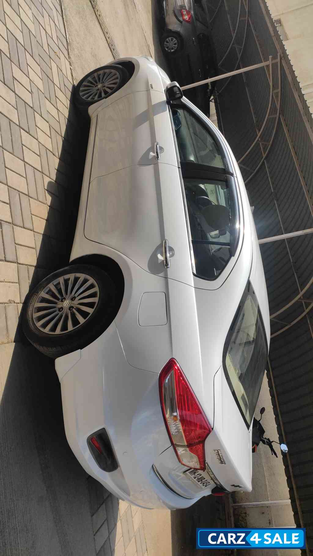 Pearl White Maruti Suzuki Ciaz ZXI +
