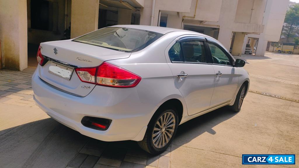 Pearl White Maruti Suzuki Ciaz ZXI +