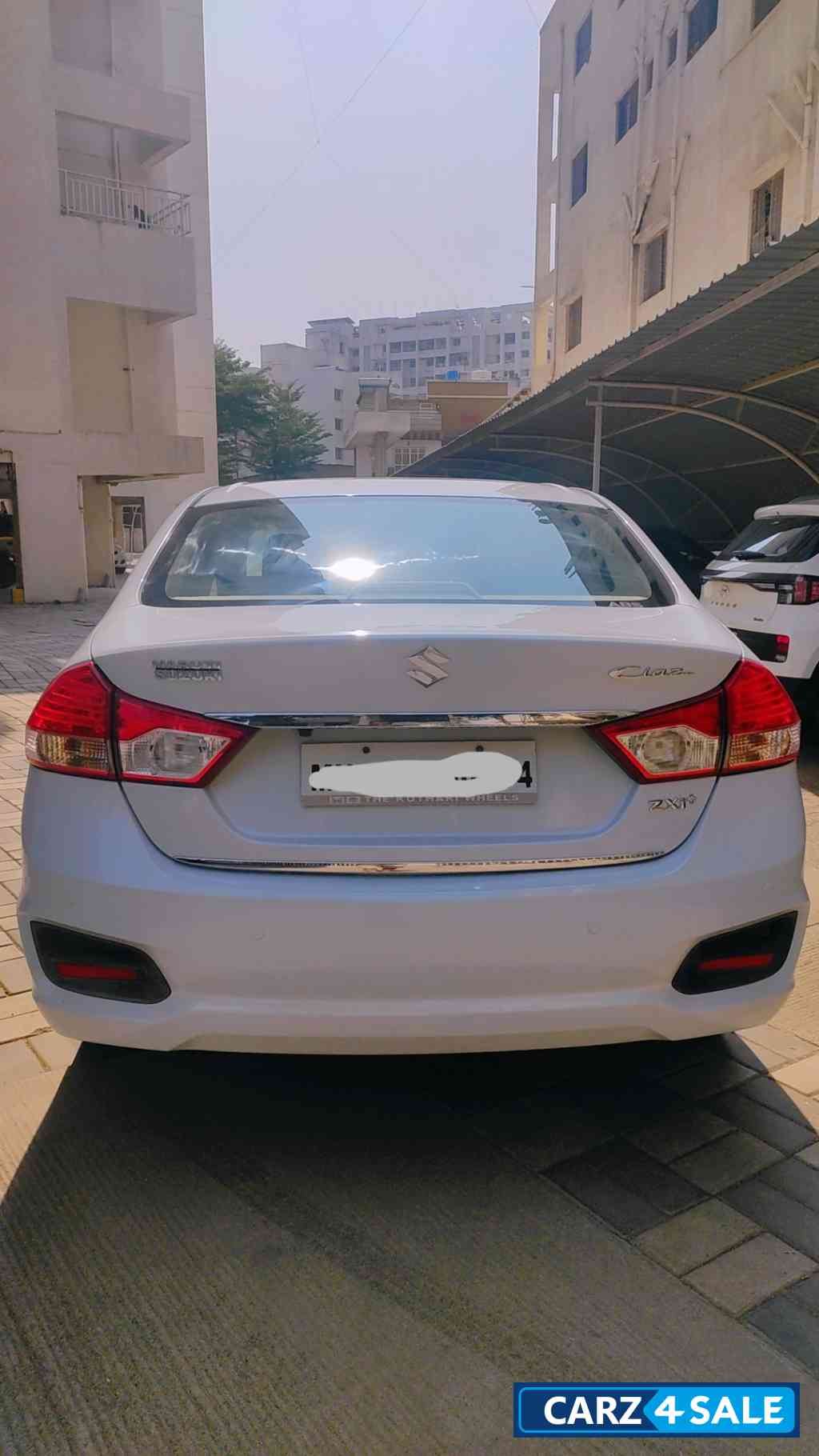 Pearl White Maruti Suzuki Ciaz ZXI +