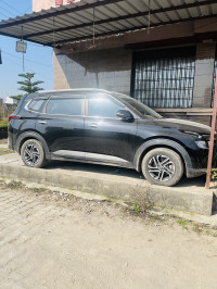 Black Kia Carens D1.5 6MT Prestige Plus 7