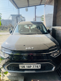 Black Kia Carens D1.5 6MT Prestige Plus 7