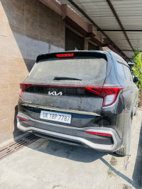 Black Kia Carens D1.5 6MT Prestige Plus 7