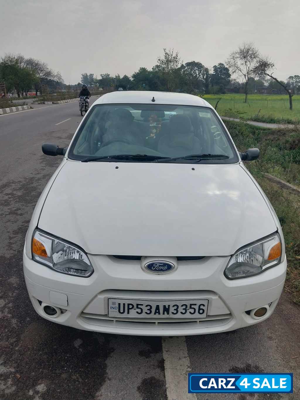 White Ford Ikon Icool