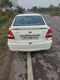 White Ford Ikon Icool