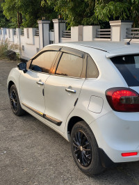 White Maruti Suzuki Baleno Delta