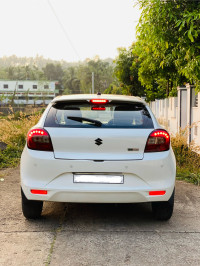 White Maruti Suzuki Baleno Delta