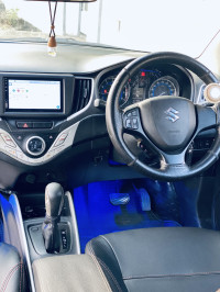 White Maruti Suzuki Baleno Delta