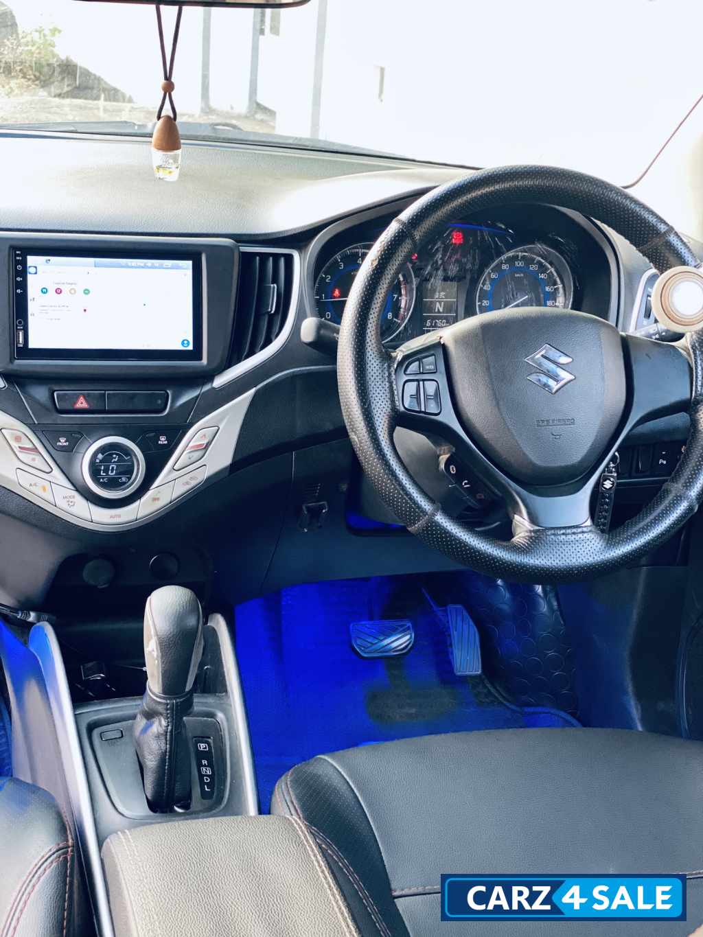 White Maruti Suzuki Baleno Delta