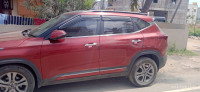 Red Kia Seltos HTX