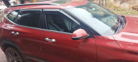 Red Kia Seltos HTX