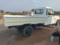 White Mahindra Bolero Maxi truck plus