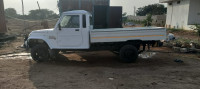 White Mahindra Bolero Maxi truck plus