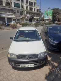 White Maruti Suzuki Alto Lxi