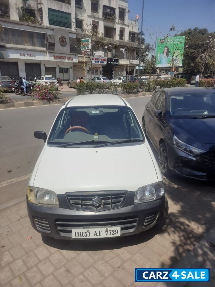 White Maruti Suzuki Alto Lxi