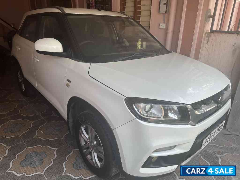 White Maruti Suzuki Vitara Brezza ZDi