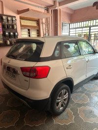 White Maruti Suzuki Vitara Brezza ZDi