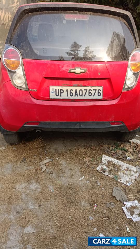 Red Chevrolet Beat