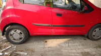 Red Chevrolet Beat