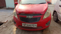 Red Chevrolet Beat