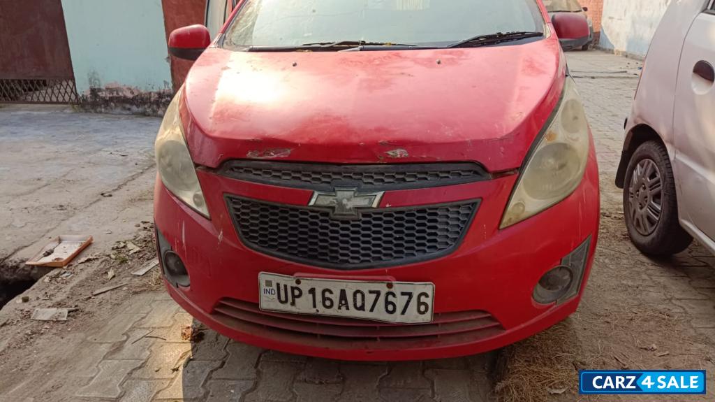 Red Chevrolet Beat