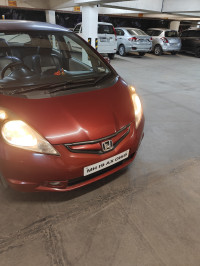 Maroon Honda Jazz Active