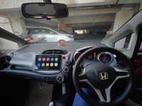 Maroon Honda Jazz Active