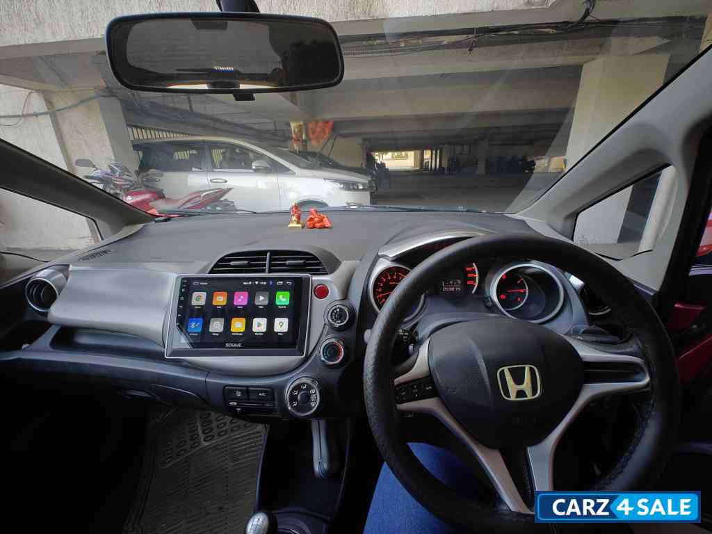 Maroon Honda Jazz Active