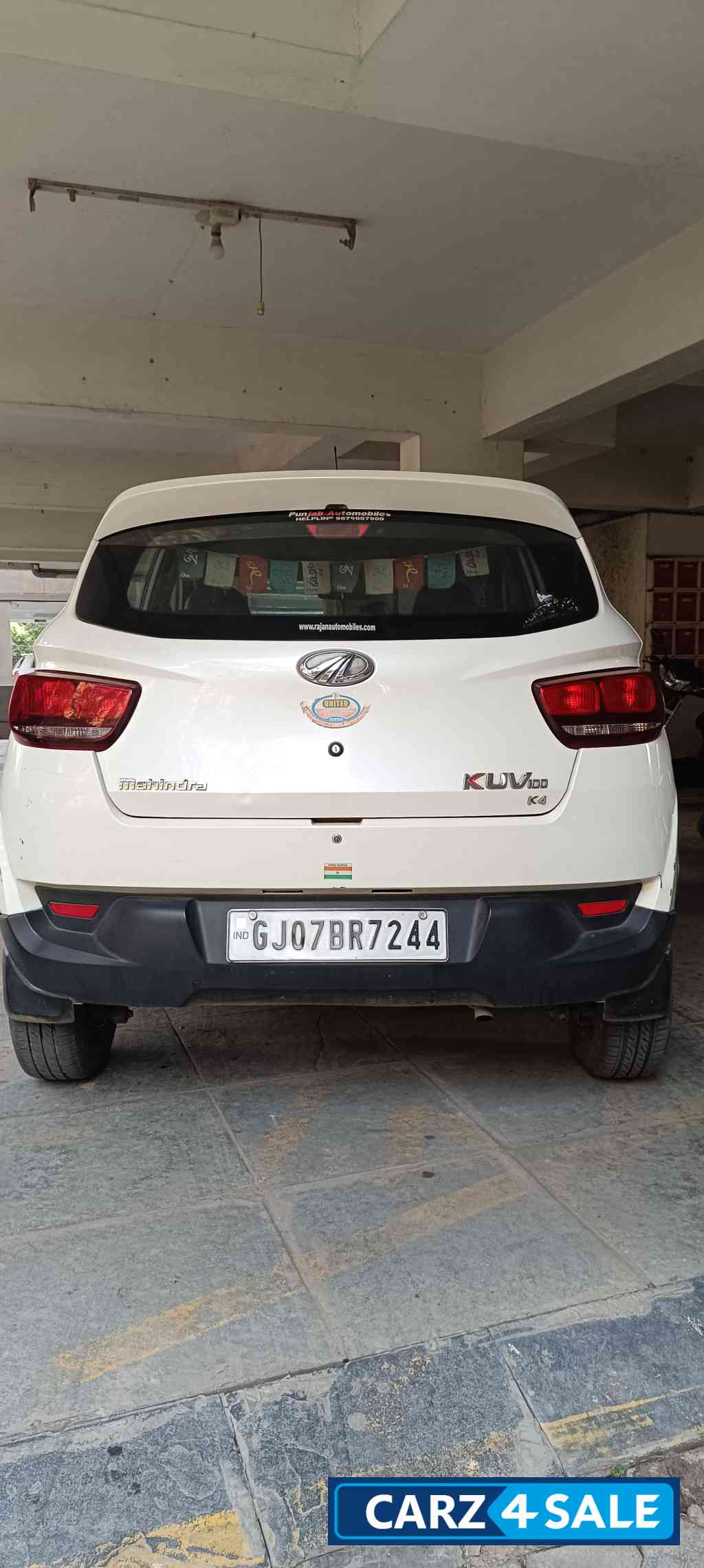 White Mahindra KUV100 K4 6 Seater