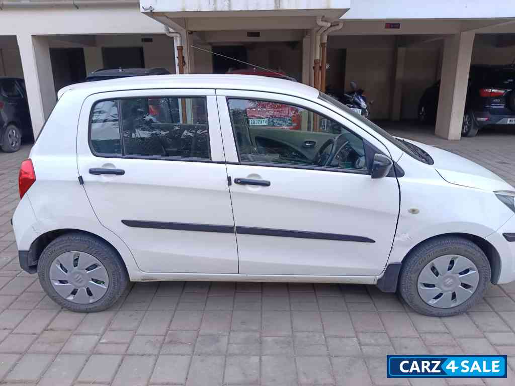 Pearl Arctic White Maruti Suzuki Celerio Vxi CNG Green