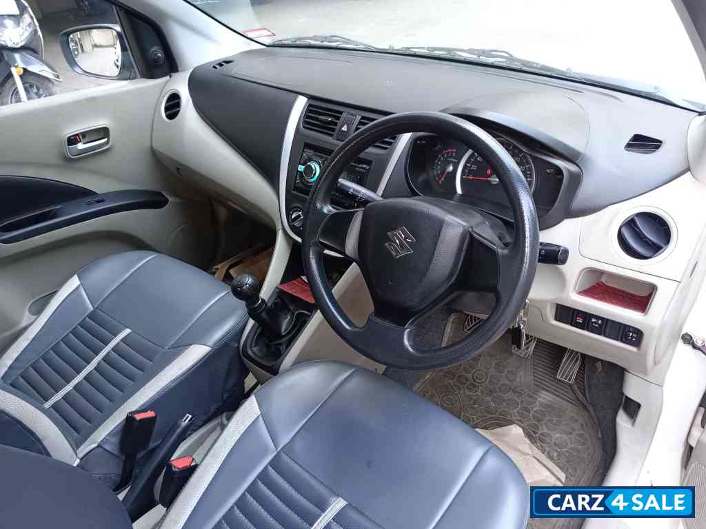 Pearl Arctic White Maruti Suzuki Celerio Vxi CNG Green