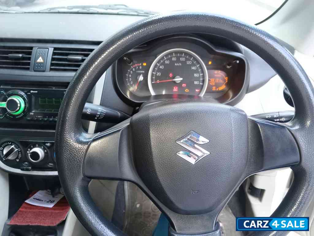 Pearl Arctic White Maruti Suzuki Celerio Vxi CNG Green