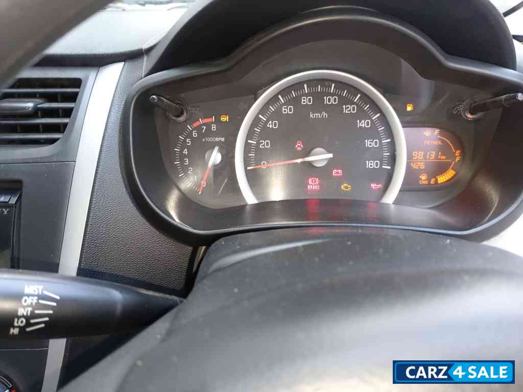 Pearl Arctic White Maruti Suzuki Celerio Vxi CNG Green