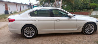 Alphine White BMW 5-Series 520 luxury line