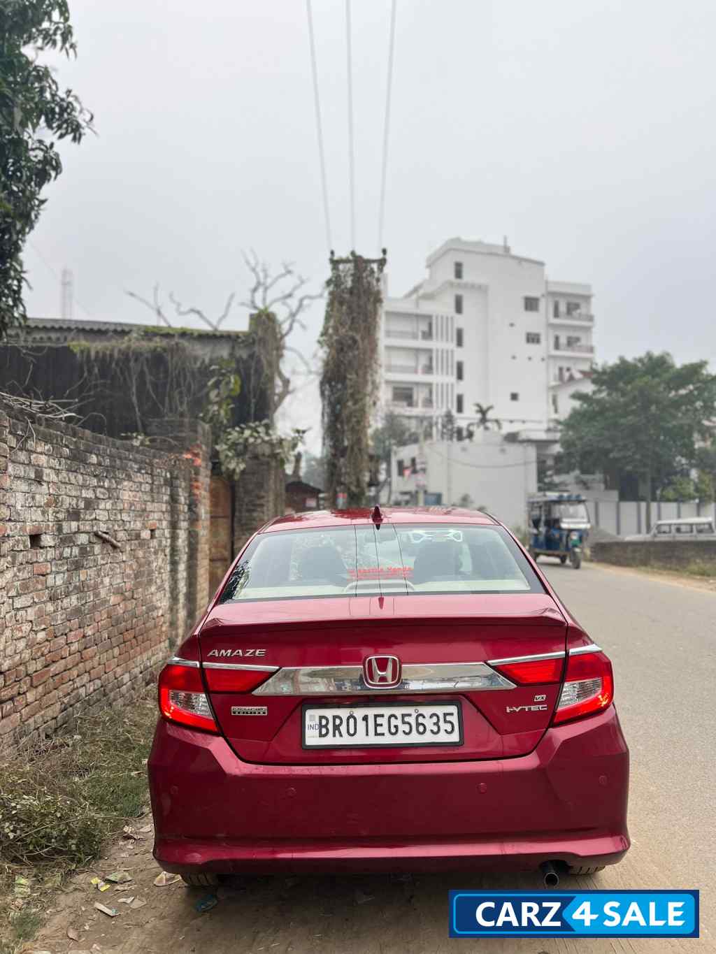 Red Honda Amaze Exclusive edition