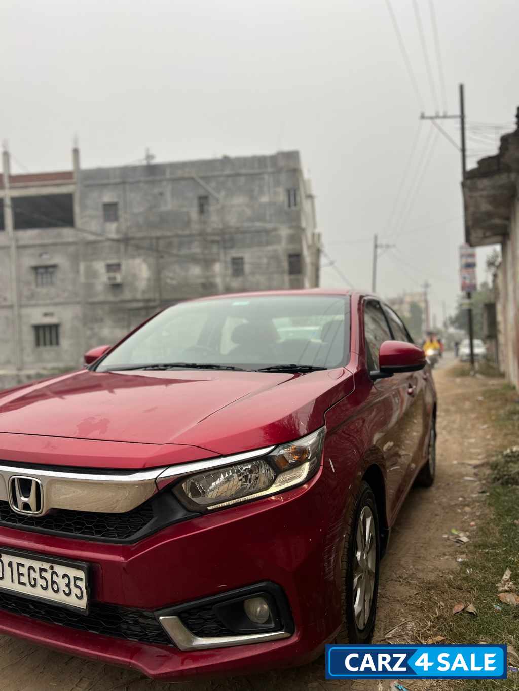 Red Honda Amaze Exclusive edition