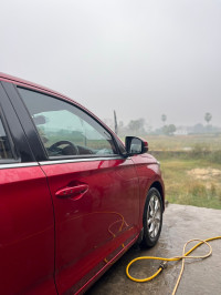 Red Honda Amaze Exclusive edition