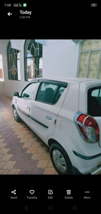 White Maruti Suzuki Alto Lxi