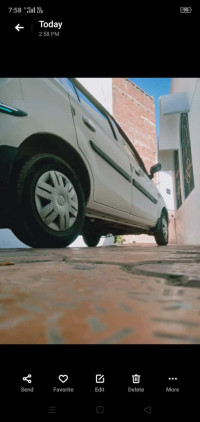 White Maruti Suzuki Alto Lxi