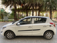 Coral White Hyundai i20 1.4 Sportz Diesel - 2013