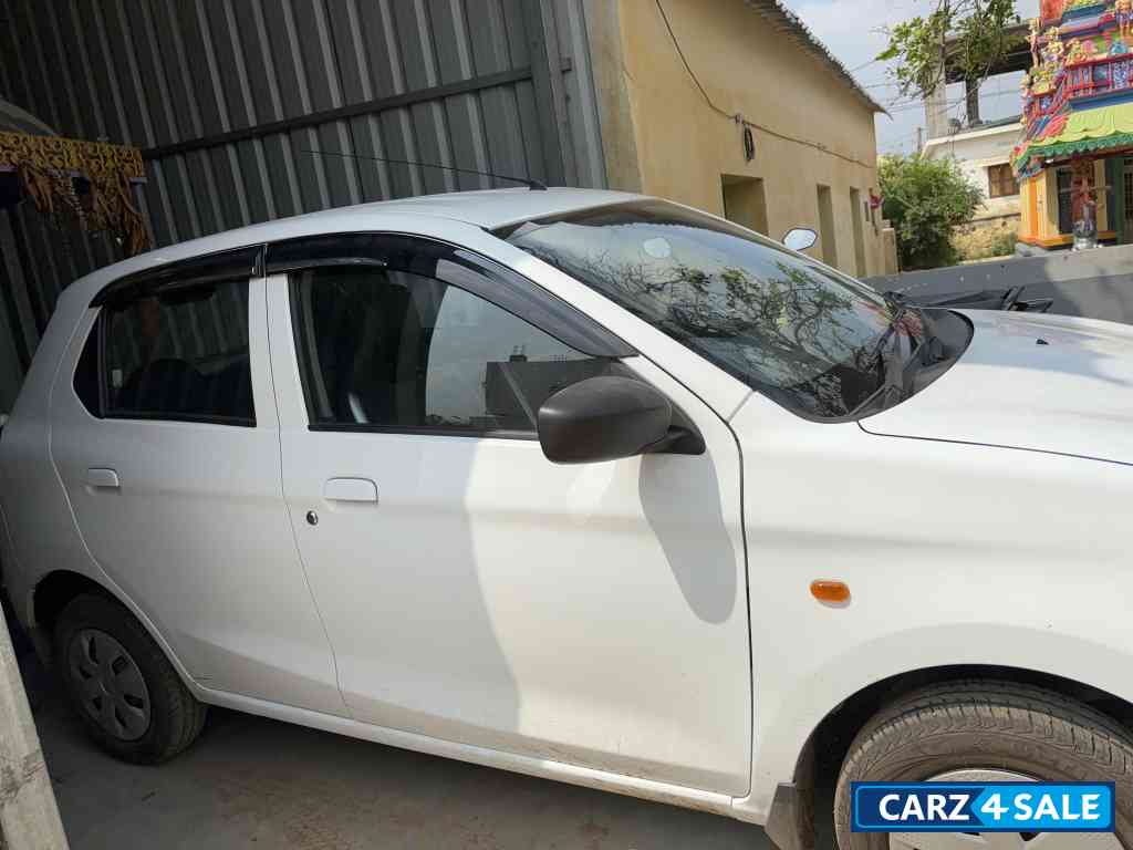White Maruti Suzuki Alto K10 vxi