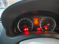 White Maruti Suzuki Ertiga vxi