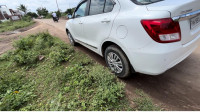 White Maruti Suzuki Dzire vxi