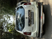 White Renault Duster rxe petrol