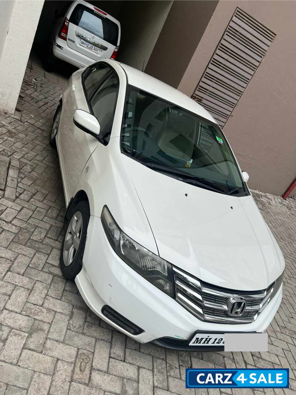 White Honda City SAT